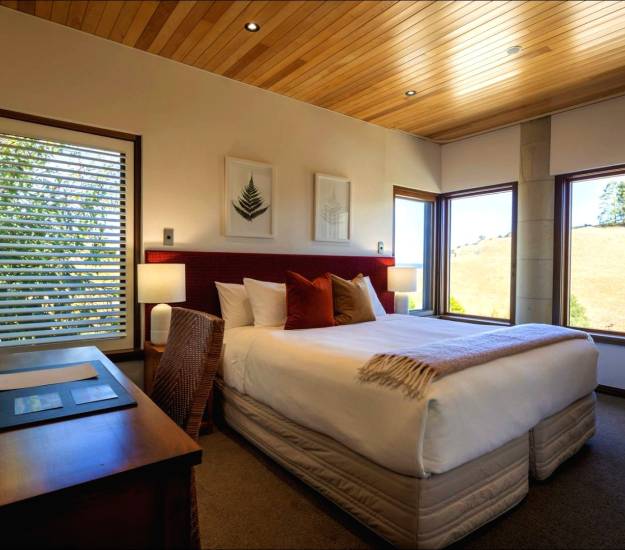 Bedroom in the Deluxe Takatimu Suite | Cabot Lodge | Luxury Hotel Fiordland | Luxury Hotel Te Anau